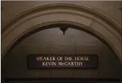  ?? MARK SCHIEFELBE­IN — THE ASSOCIATED PRESS ?? The name of Rep. Kevin McCarthy, R-Calif., remains on the sign at the entrance of the offices of the speaker of the house on Capitol Hill in Washington on Wednesday one day after he was ousted from the speaker’s position.