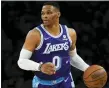  ?? ASHLEY LANDIS — THE ASSOCIATED PRESS FILE ?? Los Angeles Lakers guard Russell Westbrook (0) controls the ball during an NBA basketball game against the New Orleans Pelicans in Los Angeles,