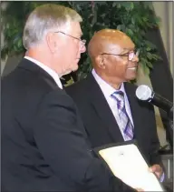  ?? Contribute­d photo ?? Dr. Allen Day: Mayor Frank Hash presents Dr. Sherwin Aaron Allen Sr., with a signed proclamati­on declaring June 9, named in his honor.