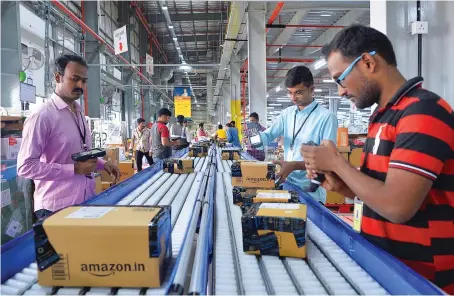  ?? AFP ?? Amazon says that if the Future-Reliance deal goes ahead it will cause irreparabl­e harm and injury to the successful US commerce giant.