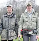  ??  ?? >
Metal detectoris­ts Joe Kania (left) and Mark Hambleton