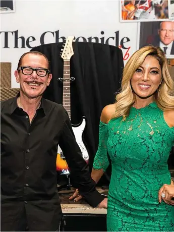  ?? Photo: Trev Sloan - Sloan Photograph­y ?? ROCK ON: INXS band member Kirk Pengilly and presenter Jo Casamento were a big hit at the August Chronicle Club function held at the City Golf Club.