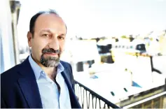  ?? — AFP photo ?? Farhadi poses on Friday in Paris.