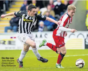  ??  ?? On the run John McGinn chases down Rory McKenzie