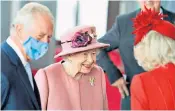  ?? ?? The Queen, pictured with the Prince of Wales and Duchess of Cornwall, should be encouraged to take a step back or sideways, according to one royal biographer