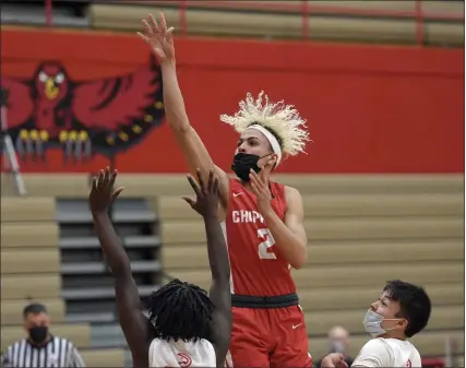  ?? PHOTOS BY DAVID DALTON — FOR MEDIANEWS GROUP ?? Devin Lilly of Chippewa Valley takes a shot near the basket during the first half of a Division 1district semifinal game against Troy Athens.