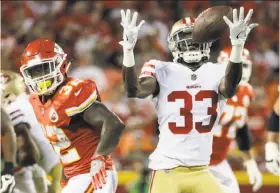  ?? Charlie Riedel / Associated Press ?? After making a mess of things early against Kansas City, 49ers cornerback Rashard Robinson rebounded nicely and had an intercepti­on.