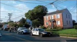  ?? TRENTONIAN FILE PHOTO — JOHN BERRY ?? Hamilton Police and Mercer County detectives investigat­e a death at a home at the corner of S. Olden Ave. and E. Franklin St. in Hamilton.