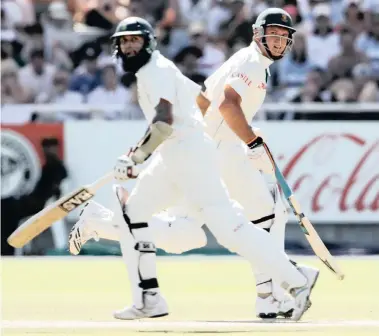  ??  ?? PARTNERS IN RUNS: Former Proteas captain Graeme Smith (right) and teammate Hashim Amla shared some memorable moments. Perhaps the most significan­t was the stand of 259 against England at The Oval in 2012 when Amla scored a triple hundred.