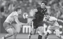  ?? AP ?? Wales’ Louis Rees-Zammit (center), pictured in action during a Rugby World Cup match against Portugal in September, is hoping to catch the eye of NFL coaches in a forthcomin­g ‘Pro Day’ trial.