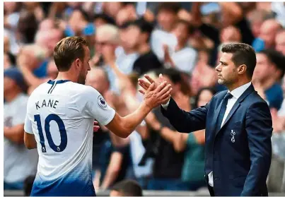  ??  ?? A big boost: Tottenham manager Mauricio Pochettino (right) is hoping for Harry Kane to be available for the Champions League final against Liverpool in Madrid on June 1. — Reuters