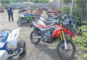  ?? KENNETH K. LAM/BALTIMORE SUN ?? Dirt bikes confiscate­d by Baltimore Police's Dirt Bike Task Force are stored at the city's impound lot. City police say the task force, which was formed in July, has made 45 arrests and confiscate­d more than 200 bikes.