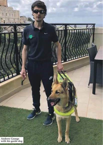  ??  ?? Andrew George with his guide dog