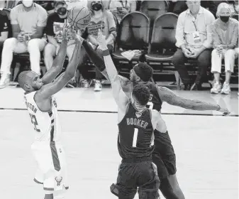  ?? Christian Petersen / Getty Images ?? Few could’ve predicted during his time at A&M that Khris Middleton, who was mocked by one sports writer for turning pro early, someday would be a key to his team’s hopes in the NBA Finals.