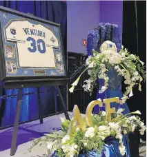  ?? JOHN SLEEZER/THE ASSOCIATED PRESS/FILES ?? A jersey and flowers adorn the front of a room at a team memorial for Kansas City Royals pitcher Yordano Ventura last month in Kansas City, Mo. The Royals will soon report to spring training without the ace who led them to a World Series title.