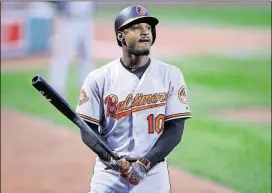  ??  ?? The Baltimore Orioles’ Adam Jones says the widely condemned racial insult hurled at him at Fenway Park illustrate­s the need for dialogue about race and for fans to police each other. Jones spoke Saturday at the Negro Leagues Baseball Museum in Kansas...