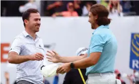  ?? Photograph: Vaughn Ridley/Getty Images ?? Nick Taylor is congratula­ted by Tommy Fleetwood after their playoff at the Canadian Open.