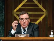  ??  ?? LOOKING FOR ANSWERS: Senate Intelligen­ce Committee Chairman Sen. Mark Warner, D-Va., questions FireEye CEO Kevin Mandia, SolarWinds CEO Sudhakar Ramakrishn­a and Microsoft President Brad Smith on Feb. 23.