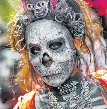  ?? Picture: Getty Images ?? Nuestra Senora de la Santa Muerta (Our Lady of the Holy Death) is a female deity personifyi­ng death. Her prominent cult holds many poor Hispanic Americans in its grip