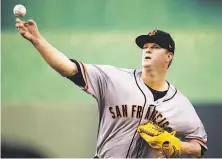  ?? Charlie Riedel / Associated Press ?? Right-hander Matt Cain has allowed two earned runs over 12 innings in his past two starts, both Giants wins.