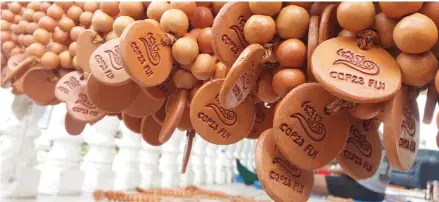  ?? Photo: Arieta Vakasukawa­qa ?? Some of the clay beads with the COP23 logo.