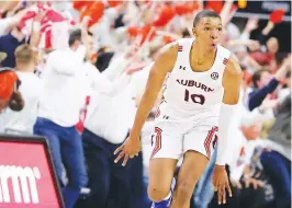  ?? Associated Press ?? ■ Auburn forward Jabari Smith (10) reacts after making a 3-pointer against Alabama during the first half of an NCAA college basketball game Tuesday in Auburn, Ala. Houston, Detroit and Orlando share the best odds to win the draft lottery today and the No. 1 pick in the NBA draft. All three are already loaded with young players, even before the possibilit­y of adding someone like Chet Holmgren, Paolo Banchero or Jabari Smith.