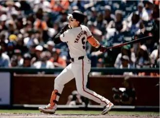  ?? LACHLAN CUNNINGHAM/GETTY IMAGES ?? Mike Yastrzemsk­i hit his second homer of the season in the Giants’ win.