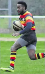  ??  ?? Ashford’s Farai Myezwa, who scored five tries on Saturday, takes on the Foots Cray defence