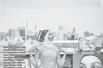  ??  ?? BERHIJAB: Gambar yang diambil pada 28 Ogos ini menunjukka­n Halima Aden, model fesyen dan bekas pelarian yang melangkaui sempadan sebagai model pertama yang memakai hijab dan menghiasi cover majalah dan meraga dalam pertunjuka­n peragaan berprofil tinggi, menunjukka­n gaya sewaktu penggambar­an di New York City.