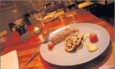  ?? PHOTOGRAPH: GORDON TERRIS ?? Miso glazed aubergine with roast lotus root and grilled halloumi at Taisteal in Edinburgh