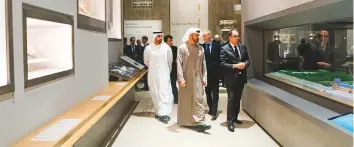  ??  ?? Shaikh Mohammad Bin Zayed tours the Shaikh Zayed Centre at the Louvre in Paris on Wednesday. Left: Shaikh Mohammad Bin Zayed meeting with a group of Emirati students attending French universiti­es and institutes. WAM