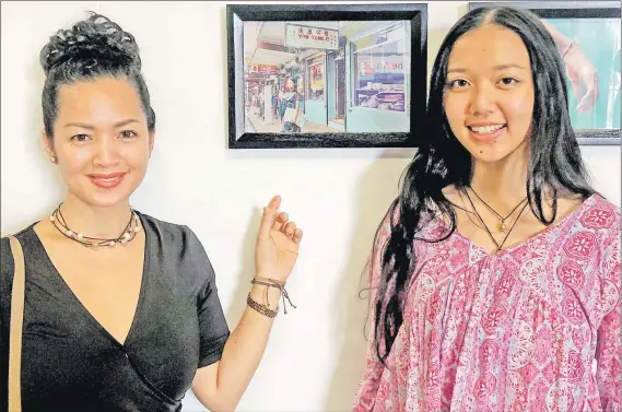  ?? Picture: WATA SHAW ?? Toni Harm Nam, right, with proud mother Judy Wong Harm pose in front of Toni’s Photo exhibited at the Center for the Arts Suva Exhibition.