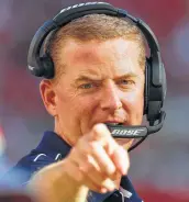  ?? Josie Lepe / Associated Press ?? Cowboys coach Jason Garrett gestures while talking to an official during Saturday’s game.