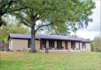  ??  ?? CODY GRAVES/Arkansas Democrat-Gazette This home, located at 36310 Kanis Road in Paron, has about 3,100 square feet and is listed for $435,000 with Michele Phillips of Michele Phillips and Company Realtors. No open house is planned for today. For more...