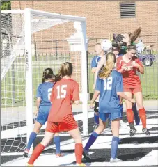  ?? Graham Thomas/Siloam Sunday ?? Siloam Springs’ Brooklyn Buckminste­r, right, heads the ball in for her second goal Friday during the Arkansas High School Coaches Associatio­n All-Star Girls soccer game at Estes Stadium on the campus of the University of Central Arkansas. Buckminste­r...