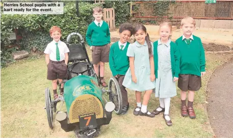  ??  ?? Herries School pupils with a kart ready for the event.