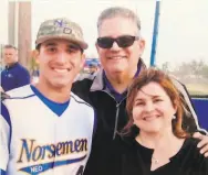  ?? Courtesy Ramon Laureano ?? Laureano with his parents, Ramón and Nina, when he played at Northeaste­rn Oklahoma A&M College.