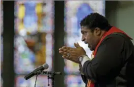  ?? GERRY BROOME — THE ASSOCIATED PRESS FILE ?? Rev. William Barber, president of the state chapter of the NAACP and architect of the protests known as “Moral Monday, speaks during a Bible study at Pullen Memorial Baptist Church in Raleigh, N.C.