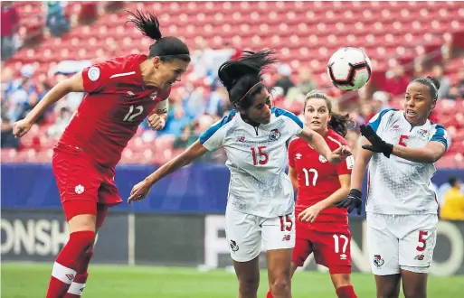  ?? ANDY JACOBSOHN THE ASSOCIATED PRESS ?? Captain Christine Sinclair sparked the Canadian offence with a pair of goals, including a firm header past Panamanian defenders Rebeca Espinosa and Yomira Pinzon.