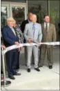  ?? BRIAN MCCULLOUGH – DIGITAL FIRST MEDIA ?? Franklin Mint Federal Credit Union President and CEO John D. Unangst cuts the ribbon Wednesday on the company’s new headquarte­rs in Chadds Ford.