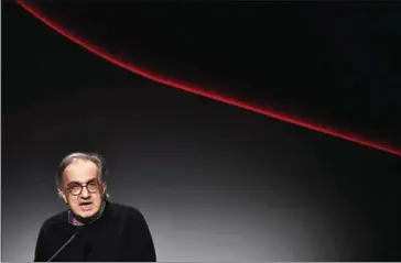  ?? BERTORELLO/AFP MARCO ?? CEO of FIAT and Chairman of Ferrari, Sergio Marchionne, gives a speech during the presentati­on of the new Alfa Romeo Sauber Formula One Team at the Alfa Romeo Historical Museum in Arese, near Milan.