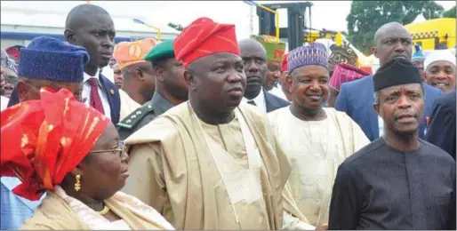  ??  ?? L-R: Lagos State deputy governor, Dr. Oluranti Adebule Ambode his Kebbi counterpar­t, Alhaji Atiku Bagudu and the Acting President, Prof. Yemi Osinbajo, during the unveiling of the LASEMA Response Unit at Cappa, Oshodi in 2016