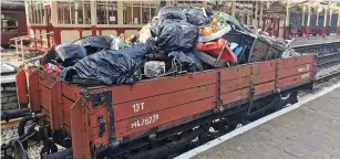  ??  ?? ●● A wagon of fly-tipped material collected from the ELR