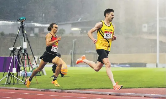  ?? ALISHA LOVRICH ?? James Preston leads Sam Tanner during the men’s 800m final at the New Zealand Track and Field Championsh­ips.