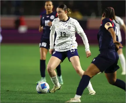  ?? PHOTO BY RAUL ROMERO ?? Olivia Moultrie, who scored two goals, controls the ball against the Dominican Republic during Tuesday night's match in Carson.