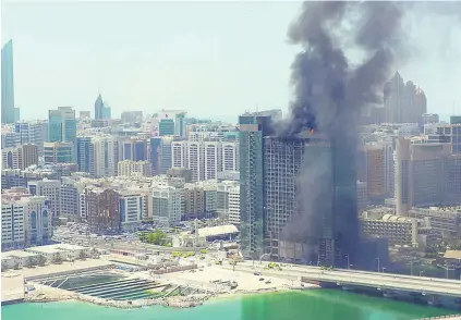  ?? Courtesy Tash Nellist ?? Fire crews were battling the blaze next to the Beach Rotana throughout the day. It started at 10.50am.