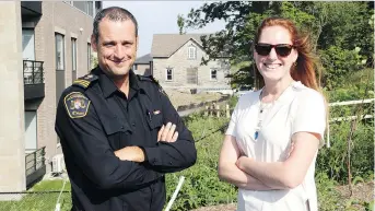  ?? JEAN LEVAC ?? Jake Gravelle, bylaw and regulatory services program manager, and Leslie Collins, heritage planner, regularly check on vacant heritage properties identified on the city’s watch list.