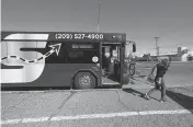  ?? ANDY ALFARO aalfaro@modbee.com ?? A rider gets off a StanRTA bus on South Ninth Street at Hosmer Avenue in Modesto, Calif., Saturday, March 16, 2024.