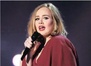  ?? Picture: AP ?? HELLO: Adele has five Grammy nomination­s.