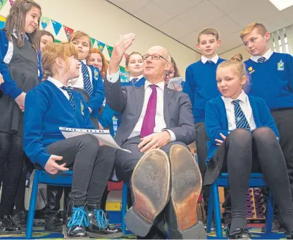  ?? Picture: Paul Reid. ?? Deputy First Minister John Swinney, pictured at Maisondieu Primary School, Brechin, could see his plans for P1 pupil tests voted down at Holyrood.